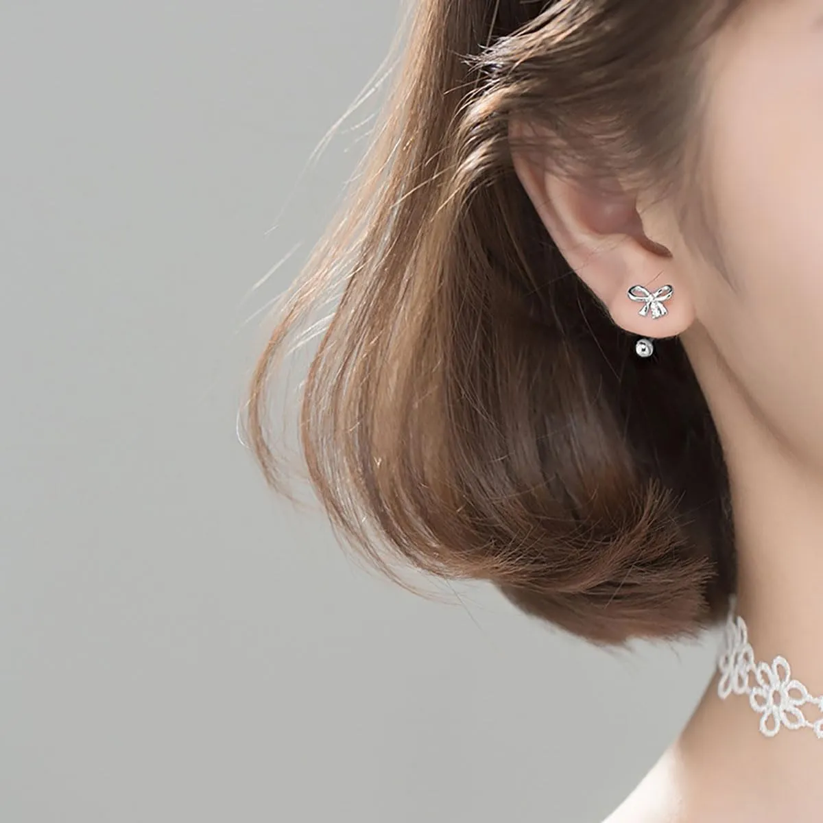 SLUYNZ Sterling Silver Bow Half Hoop Earrings for Women Teens Bow Hoop Earrings Cartilage Helix Piercing Ball Studs